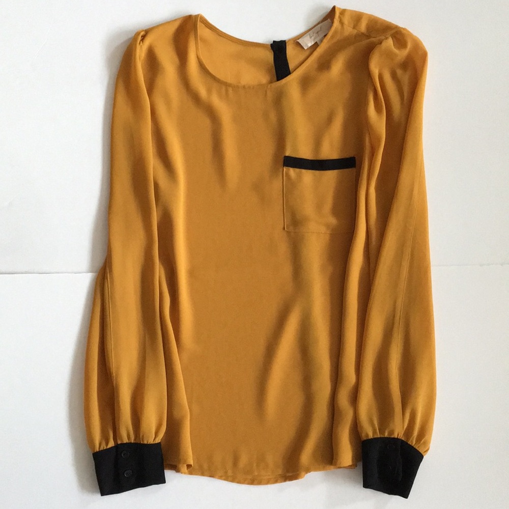 Anthropologie Lost April contrast cuff blouse
